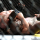 Illustration for article titled UFC 118: Boxing's Fat Fool Goes Down, And UFC's Juggernaut Rolls On, Now With Tits And Air Cannons